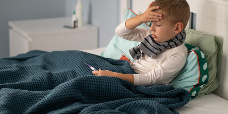 A,Little,Boy,In,A,Scarf,Is,Sick,And,Lies