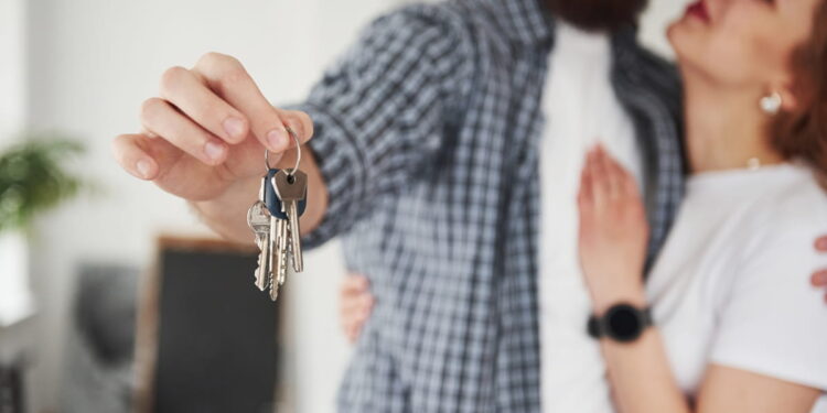 dream come true happy couple together their new house conception moving